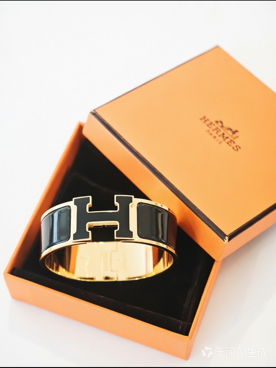 Herms Clic H Enamel Bangle In Black And Gold